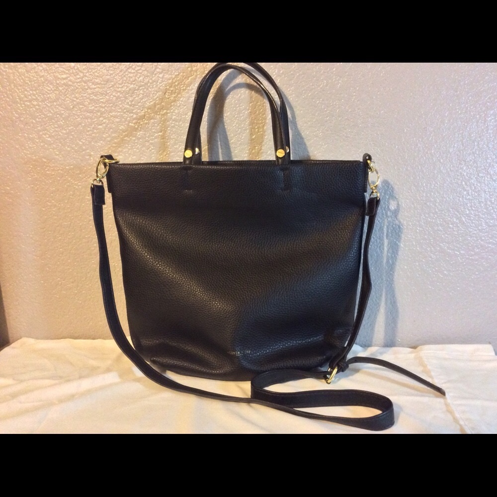 Like New- Macy’s Olivia+Joy Satchel/ Crossbody Strap. Black
Retails over $100.